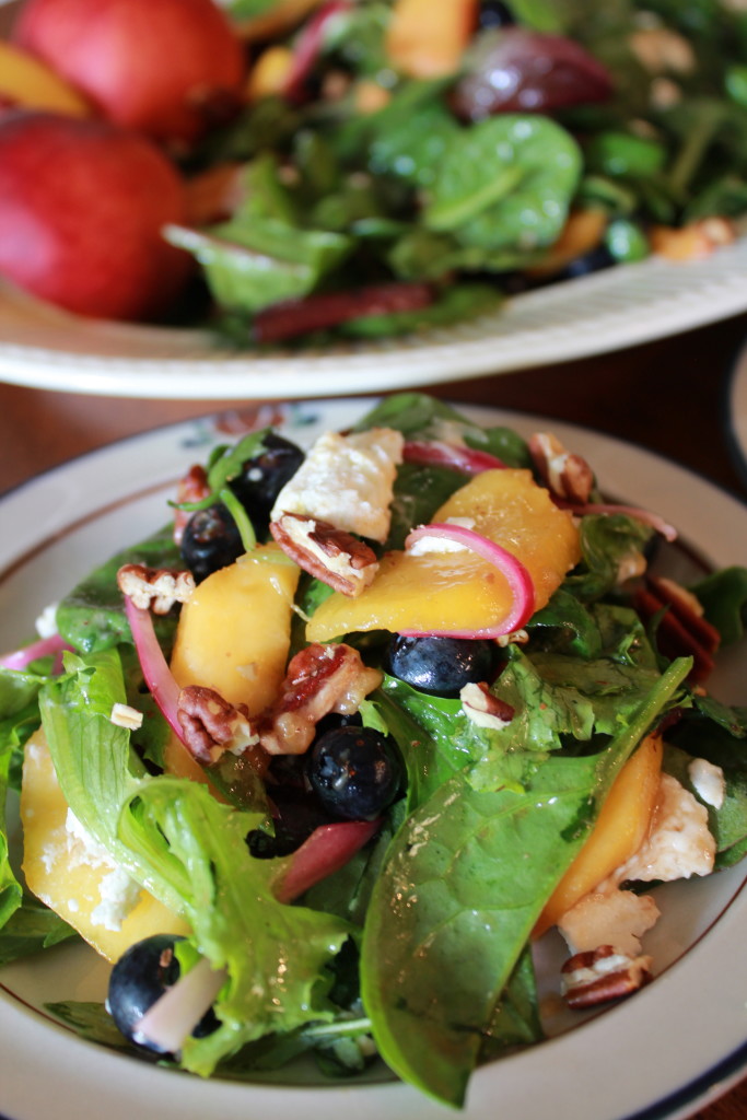 Peach & blueberry salad with pickled onions, pecans, & goat cheese