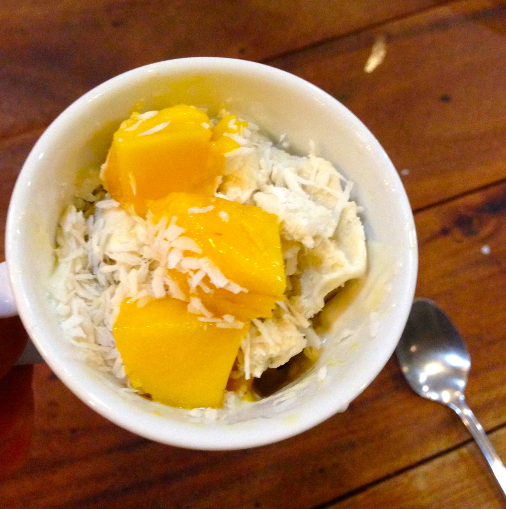 Topped with mango and unsweetened coconut… heavenly!