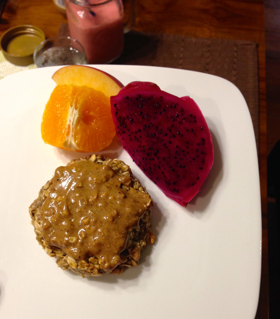 Banana oat cookie with almond butter, sliced fruit