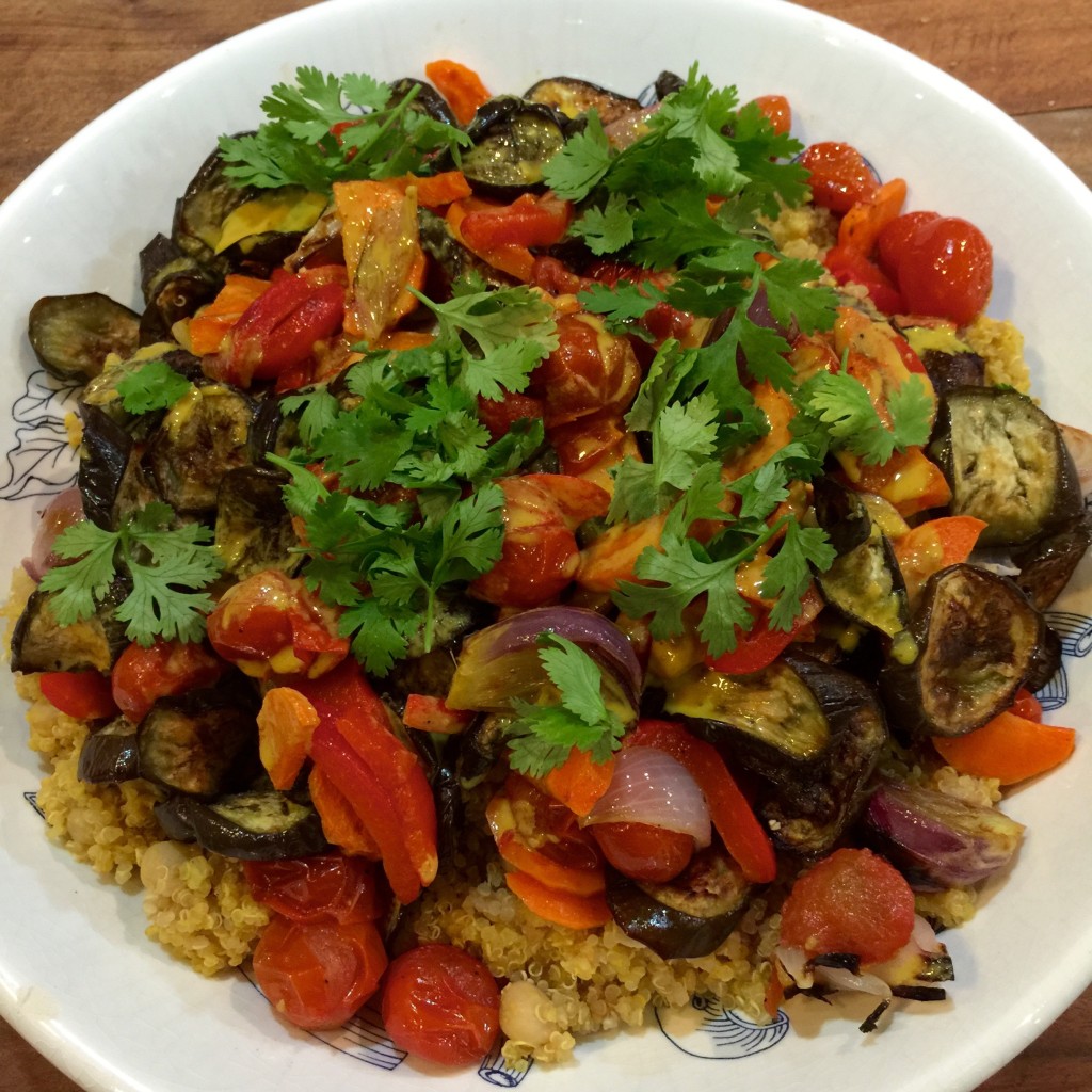 Roasted veggies with curried tahini sauce over quinoa