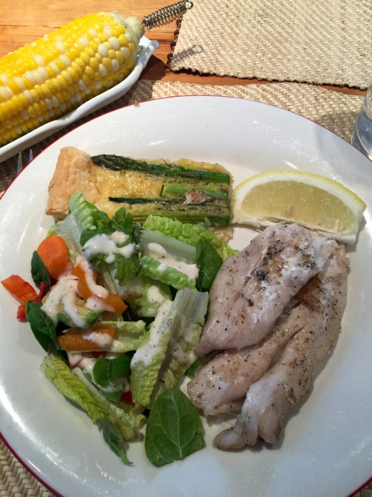 Fish, fresh corn, salad, & asparagus tart