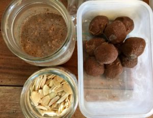 Chocolate chia pudding, peanut butter energy bites, almond flakes