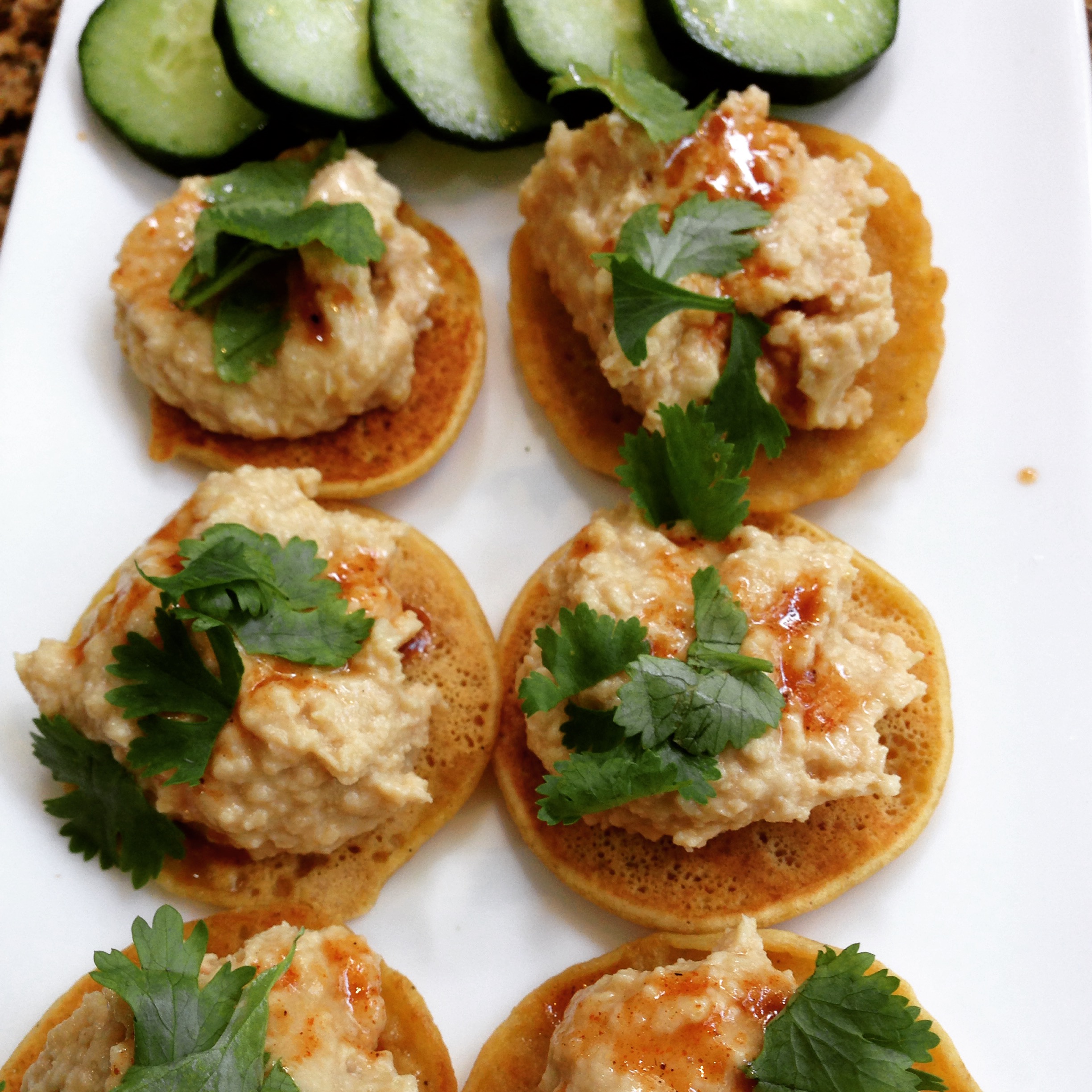 Chickpea pancakes with hummus & hot sauce