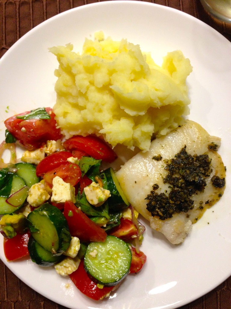 Halibut with pesto, mashed potatoes, Greek salad