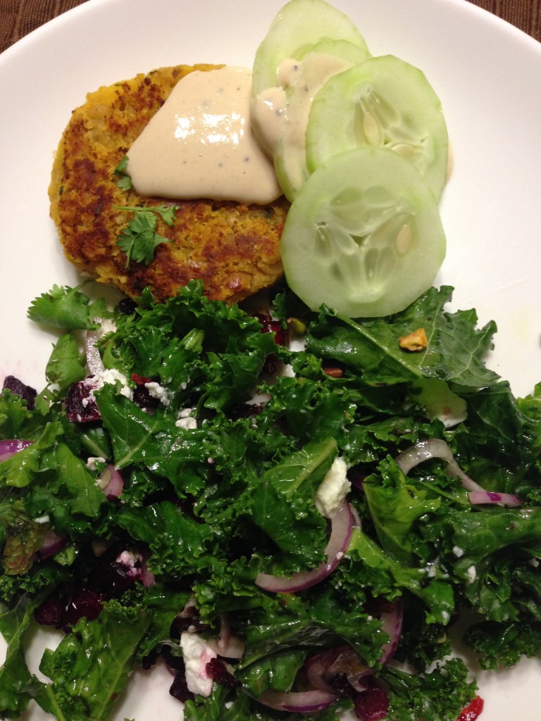 Camote falafel with curried tahini sauce, kale salad with dried cranberries, red onion & pistachios