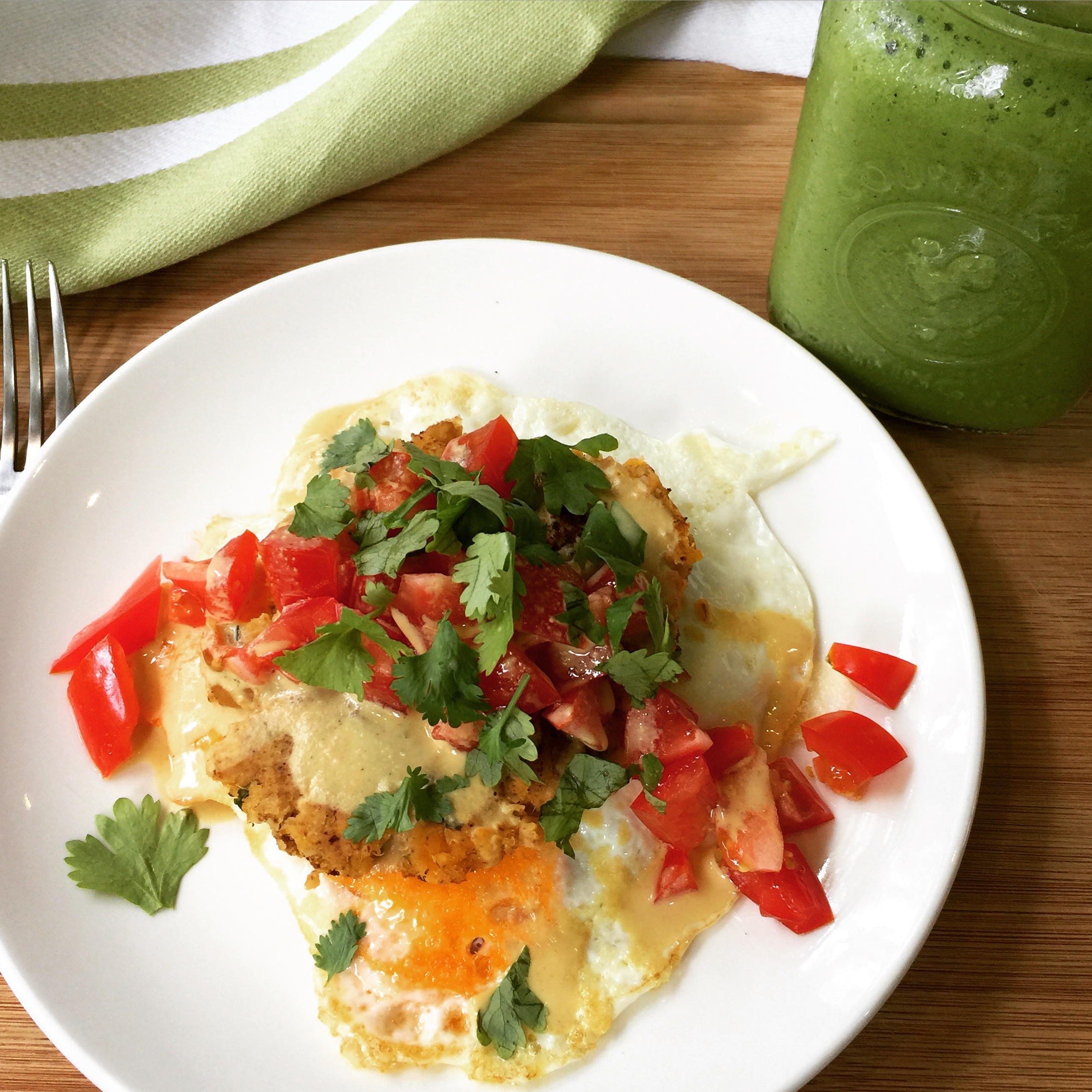 Post-workout meal: rye bread with camote falafel, over easy egg, tahini dressing, & chopped tomato.  Green smoothie!