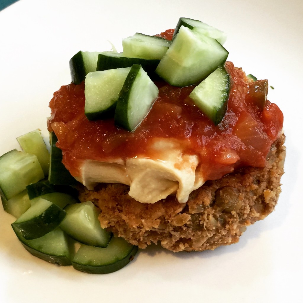 Southwest lentil burger with hummus, salsa, & cucumbers