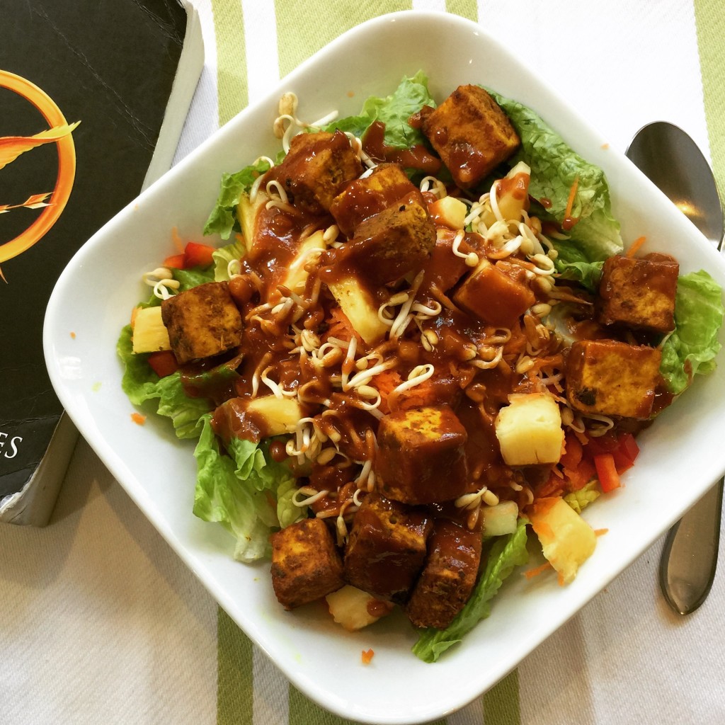 Salad with tofu satay, pineapple, & peanut sauce dressing