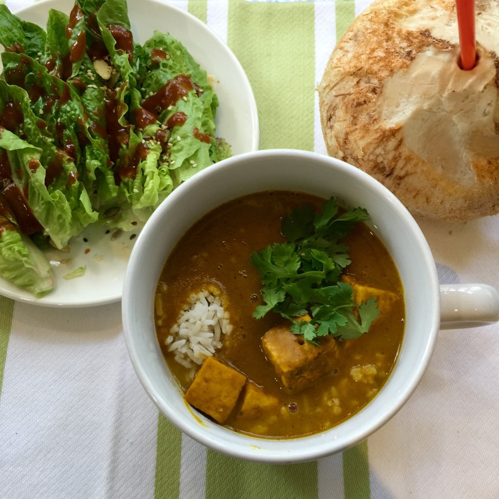 Curried pumpkin soup with tofu & rice, salad, buck