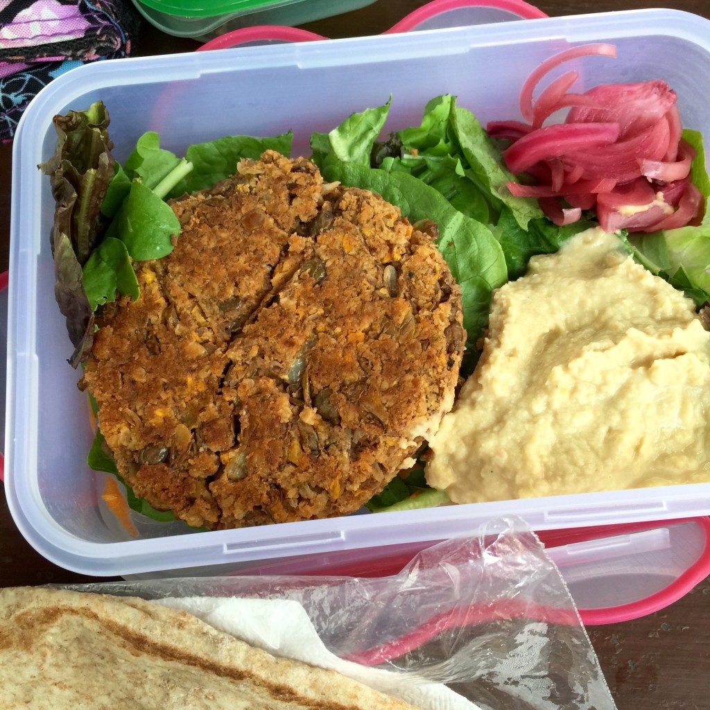 Lentil burger, hummus, salad & pickled red onion