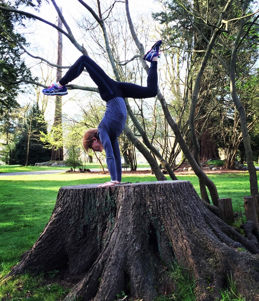 Bex handstand on tree stump