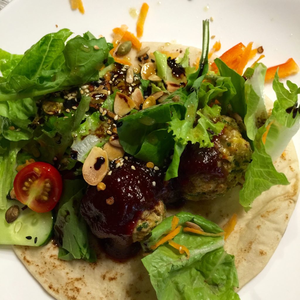 Zucchini falafel, salad, tomato chili jam