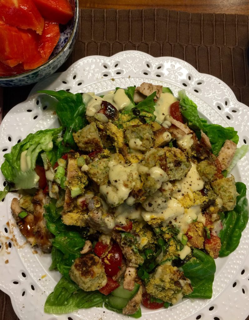 Salad with chicken & white bean pesto burger