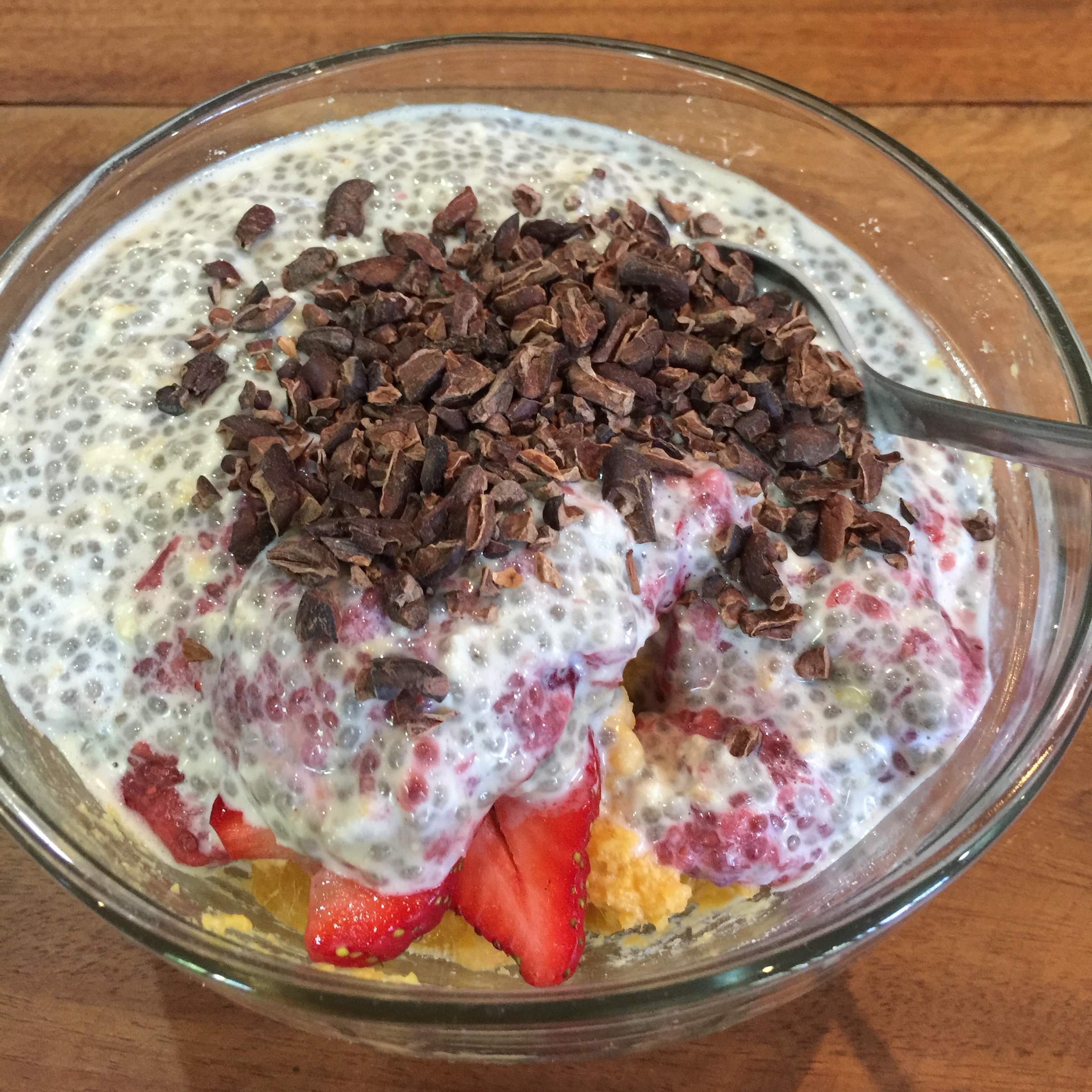 Snack: Vanilla chia oat pudding with fresh strawberries & cacao nibs, over mashed sweet potatoes... sounds weird till you try it!